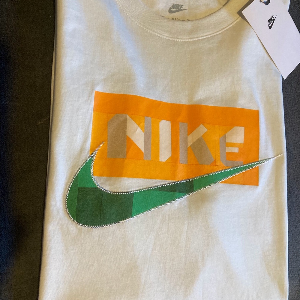 Nike White T-Shirt with Orange and Green Logo